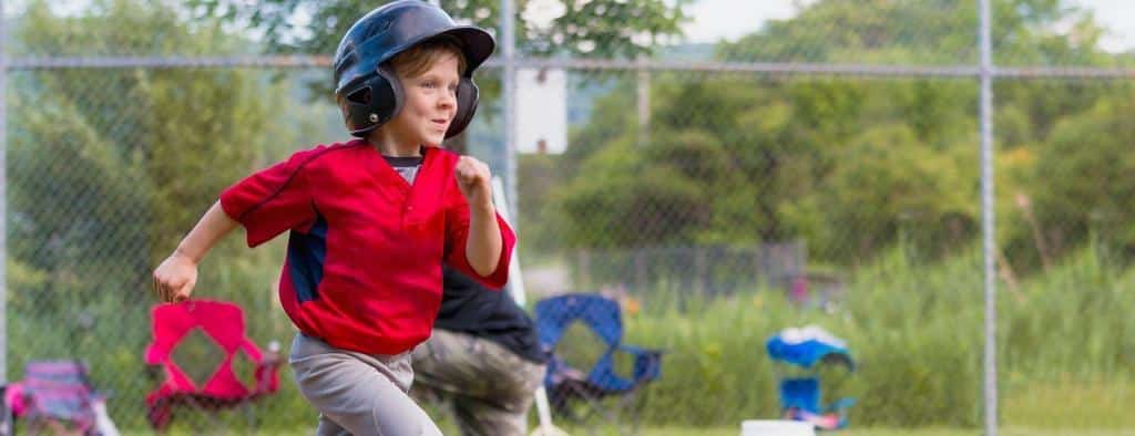 A boy playing softball