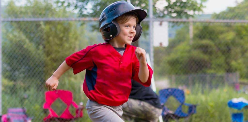 A boy playing softball
