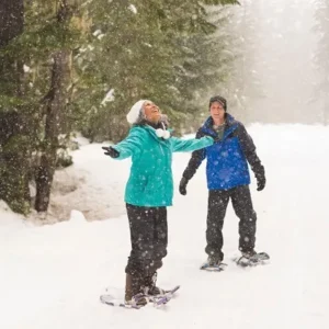 Couple enjoying snowshoeing in Eden Prairie with rental gear from North Sport Rentals