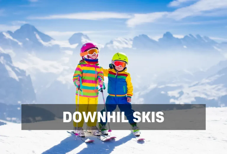 Downhill Ski Rentals for Kids - North Sport Rentals, Minnesota - North Sport Rentals Two young children in colorful ski gear standing on a snowy mountain slope with a stunning alpine landscape in the background.