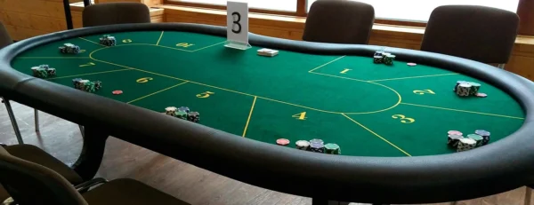 Poker table setup with numbered player positions, ideal for rental events and casual gatherings. Poker table rentals near me.