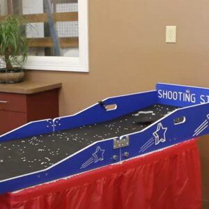 Tabletop and carnival games in use at an indoor winter event in Minnesota