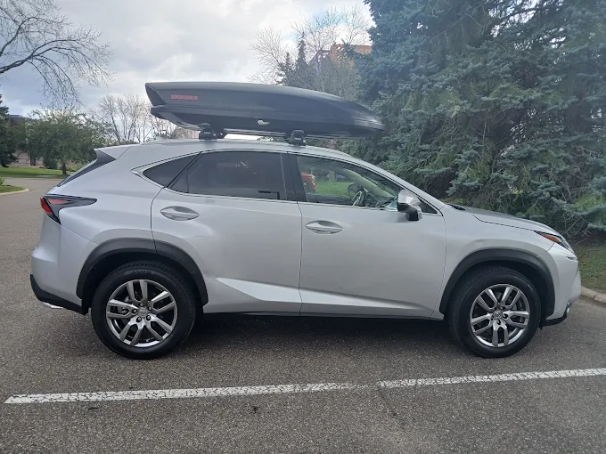 Thule cargo box installed on vehicle roof