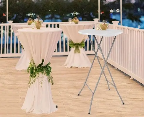 White high top cocktail table rental with fitted cover for events in Minnesota