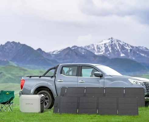 Rent Portable Battery Generator Rental for Outdoor Adventures - North Sport Rentals EcoFlow portable power station by a lake providing quiet portable power for camping, RV travel, fishing, and outdoor adventures. Rent today!