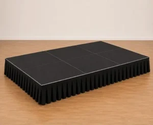 8 x 12 Modular Stage Rental with Delivery and Setup in Minnesota - North Sport Rentals 8 x 12 modular stage rental with black skirting, delivery, setup, and pickup in Minnesota
